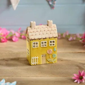 Ceramic Yellow House With Embossed Flower Painted Tea Light Holder - image 1
