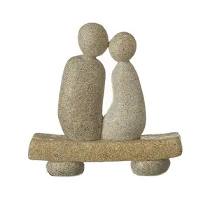Stone Couple On Bench